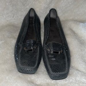 The shoes are in great shape Black dress shoes from the designer Stuart Weitzman